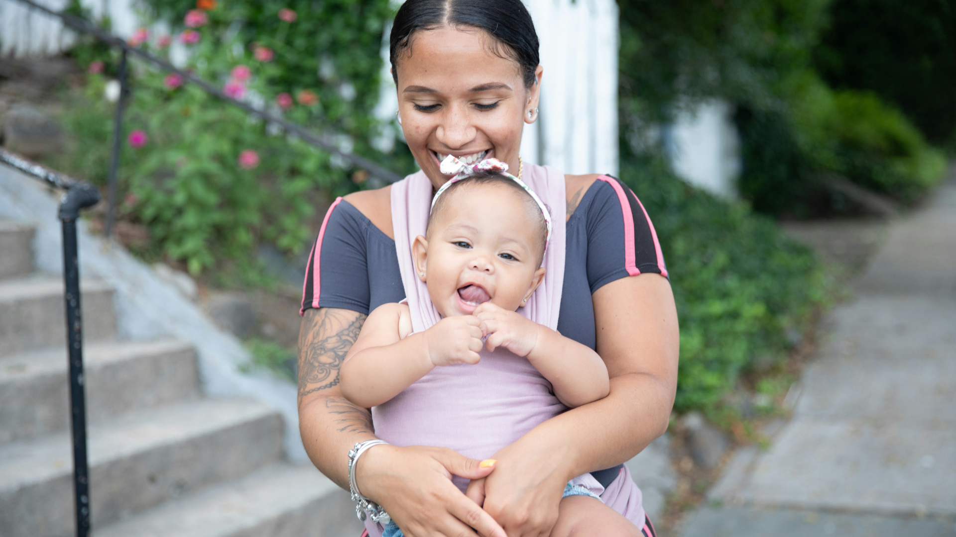 no pressure fitness mom holding baby